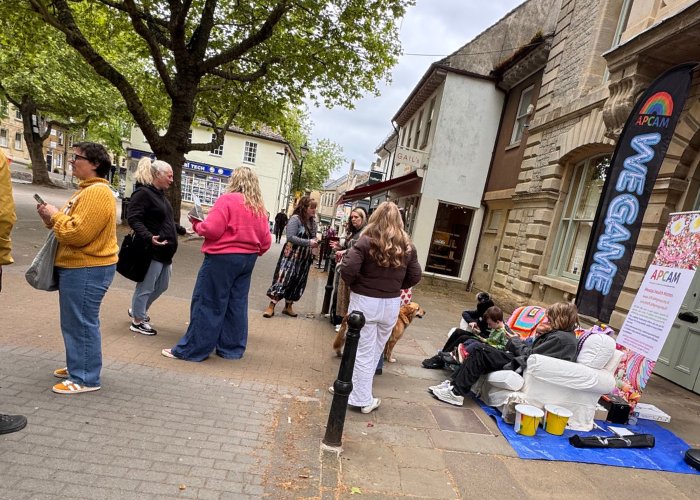 People stopping to chat at our Sofa in the Street event in Witney