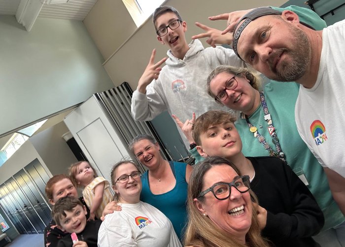 Young people, families and the APCAM team together at WeGame